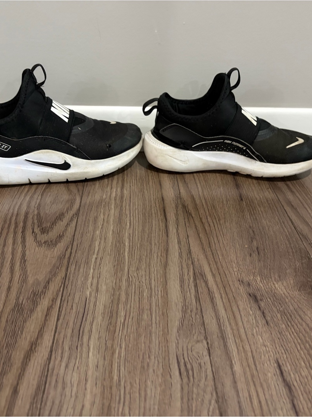 Nike Kids Black and White Slip-On Athletic Sneakers
